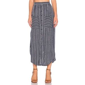 FAITHFULL THE BRAND MIDI SKIRT WITH SLITS.